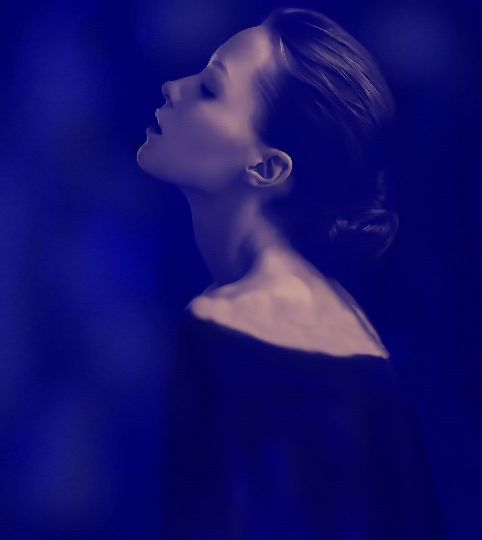 Woman in blue light